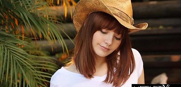  All-American beauty in a stetson hat strokes her perfect pussy